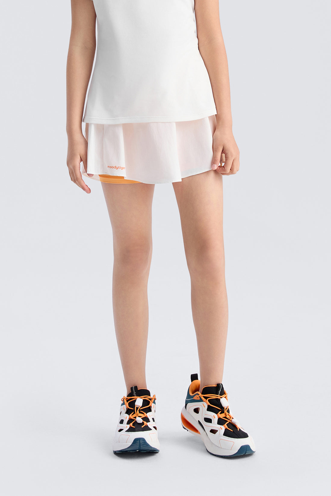 Orbit Pleated Tennis Skort **Cloud Dancer**